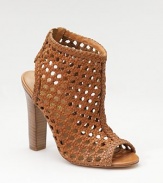 With the rich look of rattan, this striking sandal boot of woven leather has an open toe and back, plus an elastic inset for slip-into ease.Stacked heel, 4½ (115mm) Shaft, 2 Leg circumference, 11 Back elastic inset Leather lining and sole Padded insole ImportedOUR FIT MODEL RECOMMENDS ordering true size. 