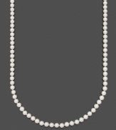 A chic and classic look that will never go out of style. Layer your neckline in elegant AA Akoya cultured pearls (6-6-1/2 mm) by Belle de Mer. Set in 14k gold. Approximate length: 20 inches.