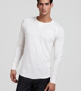 A timeless white long sleeve crewneck from The Shirt by Joe's.