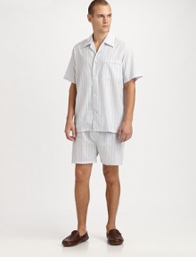 Relax and lounge-around in this remarkably comfortable two-piece short set, in easy-fitting, lightweight cotton. Machine wash. Imported.SHIRTSpread collarButtonfrontChest patch pocketSHORTSAdjustable two-button waistButton flyNo pocketsInseam, about 3½