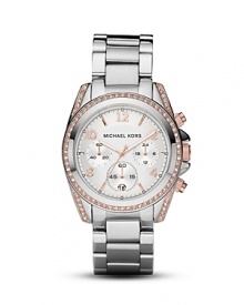 A crystal-encrusted bezel sets this chic watch to sparkle. From MICHAEL Michael Kors.