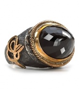 With a gold rim, Coralia Leets' distinctive smoky quartz ring marries tone and texture in a design that gives any look striking detail.