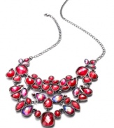 Make a ravishing statement with this necklace from INC International Concepts. Features a bib with colorful red plastic stones for a stunning effect. Crafted in hematite tone mixed metal. Approximate length: 17-1/2 inches + 2-inch extender. Approximate drop: 3 inches.