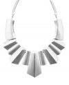 Attract attention in this head-turning necklace. Bar III's art deco-inspired statement maker features a chunky, geometric design set in matte silver tone mixed metal. Approximate length: 23-1/2 inches + 3-inch extender. Approximate drop: 6 inches.