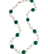 Easy on the eyes. A few precious malachite gems (12 mm) are scattered across an open 14k gold chain necklace, providing any outfit with a vibrant pop of green. Approximate length: 28 inches.