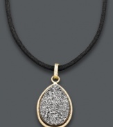 Express your individuality with this unique pendant. Crafted from 14k gold, this teardrop-shaped pendant features a grey druzy center strung from a black silk cord. Approximate length: 20 inches. Approximate pendant length: 7/8 inch. Approximate pendant width: 5/8 inch.