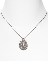 Shapely and sophisticated. Lora Paolo's crystal-encrusted pendant introduces high-wattage sparkle into your jewel box.