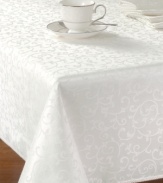 An evening of at-home fine dining is yours with Lenox's Opal Innocence tablecloth. The pattern's trademark white-on-white vine motif shimmers via contrasting luster. A corded rib on the edges of the tablecloth lends interest.