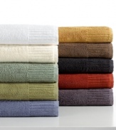 A riveting spectrum of color, the Resort bath sheet from Calvin Klein features fashionable hues set in luxurious Egyptian cotton. Attractive tufted stripes along the hem add subtle dimension. Coordinate with any bath accessories to create an invigorating bathroom retreat.