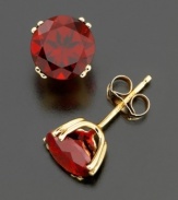 Deep-red, gorgeous garnets are a colorful alternative to classic stud earrings. These round-cut stones (4 ct. t.w.) add glamour to any look. Set in 14k gold.