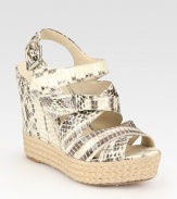 Snake-print leather complemented by an adjustable slingback strap and a timeless espadrille wedge. Leather and hemp wedge, 4½ (115mm)Hemp platform, 1 (25mm)Compares to a 3½ heel (90mm)Snake-print leather upperLeather lining and solePadded insoleImported