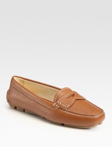 Soft leather in a timeless moccasin-inspired silhouette. Leather upper Leather lining Rubber sole Padded insole Made in ItalyOUR FIT MODEL RECOMMENDS ordering one half size up as this style runs small. 