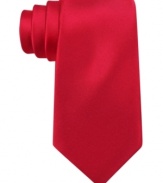 Start your day on a solid note with this sharp silk tie from Tommy Hilfiger.