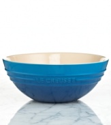 Whether you want to prep or present, this bowl is your go-to for every task in the kitchen from showcasing your fresh fruit to mixing your famous batch of cupcakes. The durable and attractive enameled exterior stands out in a brilliant hue and stands up to the wear & tear of the busiest kitchen. 5-year warranty.