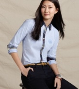 Prep school: Get educated in impeccable style with this charming button-front shirt from Tommy Hilfiger. Contrasting trim and  an embroidered logo monogram are quirky details you'll love.