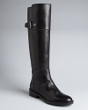 Enzo Angiolini offers high style in these elegant riding boots. Adjustable buckles create the perfect fit, with tights or jeans.