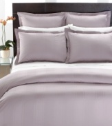 Boasting tonal jacquard stripes on 700 thread count MicroCotton, this Hotel Collection duvet cover is the essence of understated sophistication. Featuring button closure.