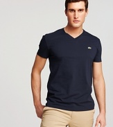 A soft pima cotton tee from Lacoste, with v-neckline and logo at left chest.