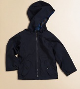 Delivering two outstanding looks in one package, this reversible topper has an attached hood, plenty of pockets and can be switched from check to solid to suit any mood.Attached hoodLong sleeves with button tab cuffsFull-zip frontAngled pocketsElastic hem63% cotton/37% nylonMachine washImported