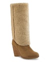 Take shearling-chic to new heights with these inside-out wedge boots from UGG® Collection.