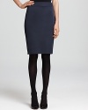 Elegant tailoring creates a sleek silhouette on this Armani Collezioni pencil skirt.