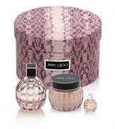 Reveal the glamorous seductress in you with this elegant Jimmy Choo gift set that includes a selection of Jimmy Choo treasures: a 3.3 oz. Eau de Parfum, 5 oz. Perfumed Body Cream, and a 0.15 oz. Eau de Parfum miniature. 