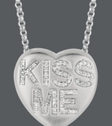 Pucker up! Sweethearts' adorable heart-shaped pendant expresses more that just great style with the words KISS ME written in round-cut diamonds (1/6 ct. t.w.) across the surface. Pendant crafted in sterling silver. Copyright © 2011 New England Confectionery Company. Approximate length: 16 inches + 2-inch extender. Approximate drop: 5/8 inch.