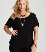 This timeless Eileen Fisher tee gets a luxurious lift in flowing silk--an elegant canvas for shimmery accessories.