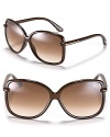 Sleek oversized sunglasses with knot detail at temples from Tom Ford.