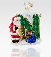 Handcrafted of ornate European glass, a brilliantly colored Santa reenacts one of our favorite Christmas scenes. Hand-blownHand-painted4 highMade in Poland