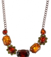 Bold and beautiful. Betsey Johnson's frontal necklace, crafted from brown gold-tone mixed metal, features colorful glass stones and crystal accents for a look that will definitely stand out. Approximate length: 16 inches + 3-inch extender. Approximate drop: 3/4 inch.