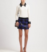 Ribbon-like pattern reinvents this fashion-daring plaid mini skirt. Elastic waistbandSide zipperAbout 18 long85% acrylic/15% woolDry cleanMade in USA of French fabricModel shown is 5'10 (177cm) wearing US size 4.