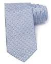 A textural pattern tie in an understated color resolves your workday attire with simple refinement.