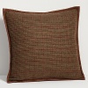 Inspired by classic haberdashery styles, this handsome throw pillow is crafted in traditional Glen plaid wool with ultra-soft velvet backing and trimmed with sleek leather accents for a luxurious finish.