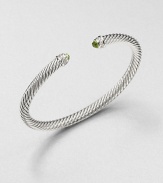 From the Cable Classics Collection. An iconic, sterling silver cable design accented with colorful peridot and sparkling diamonds. PeridotSterling silverDiamonds, .09 tcwDiameter, about 2.25Slip-on styleImported 