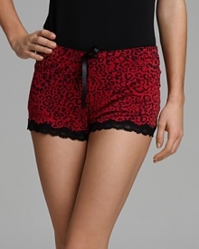 Look fierce in these red hot leopard shorts with lace trim.