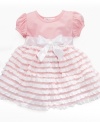 Flowing with darling ruffles and unabashed girlish charm, this adorable dress from Bonnie Baby is a perfectly pretty way to showcase precious princess.