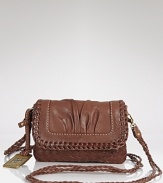 Compact style goes rugged with this Western-inspired crossbody bag from Frye. In rich leather with braided detailing, it's a perfect partner for pared down denim.