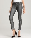 A reflective metallic coating lends a hypermodern edge to these GUESS skinny jeans.