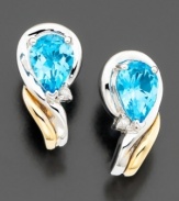 Breathtaking beauty in an elegant earring. Pear-shaped blue topaz (1-5/8 ct. t.w.) with round-cut diamond accents set in 14k gold & sterling silver. Approximate length: 1/2 inches.