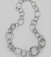 Gently hammered freeform links of sterling silver in an array of sizes and shapes give a classic chain a whole new look. Sterling silver Length, about 23 Toggle clasp Imported