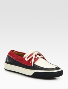 Nautical-inspired, this lace-up style is designed in smooth, tri-colored leather.Leather upper Leather liningPadded insoleRubber soleMade in Switzerland