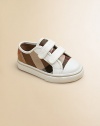 Sturdy cotton canvas in bold Burberry checks, fashioned into a low-top sneaker with all-day comfort for your young jumper, climber and playground dweller.Double grip-tape strapsCotton canvas upper with leather trimRubber solePadded insoleImported