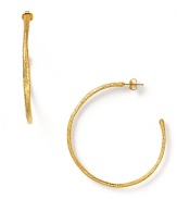 Alexis Bittar's simple textured hoops are the perfect accent to your look, day or night.