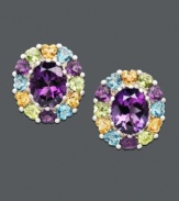 Add a playful touch to your look with fresh color. These vivid stud earrings feature clusters of gemstones including an oval-cut amethyst center (6 ct. t.w.) surrounded by blue topaz (1-1/5 ct. t.w.), citrine (7/8 ct. t.w.), and peridot (1-1/10 ct. t.w.). Crafted in sterling silver. Approximate diameter: 3/4 inch.