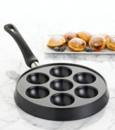 Pancakes couldn't get any better until now with a pan that makes 7 filled pancakes with ease. Pick your favorite batter and add your favorite filling-fruit, jam, chocolate and more-for a pastry cooked to perfection. Limited lifetime warranty.