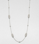 EXCLUSIVELY AT SAKS.COM. A brilliant piece with stylized oval stations on a delicate link chain. CrystalsRhodium-plated brassLength, about 36Lobster clasp closureImported 