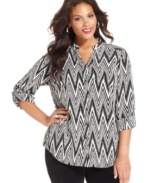 Team up your trousers with Style&co.'s printed plus size shirt.