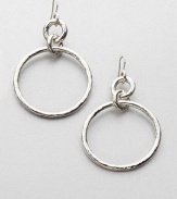 Two hammered loops, one large, one small, are linked by a third to create a simple snowman silhouette in gleaming sterling silver. Sterling silver Drop, about 2¾ Large loop diameter, about 1¾ Ear wire Imported