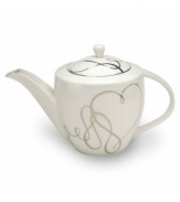 Sweet yet sophisticated, a loopy heart design sweeps across this white porcelain tea server from Mikasa. Complete with a sparkling platinum rim, this flirty ribbon pattern captivates everyone at your dinner table.